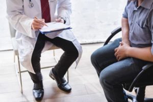 male speaking with provider about low t